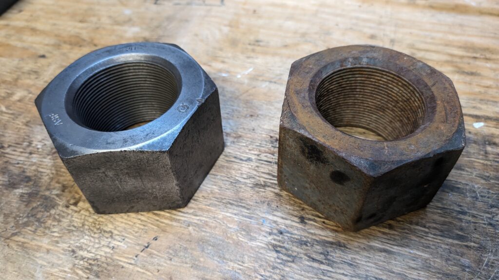 A 'before and after' test of removing rust from two big.. nuts